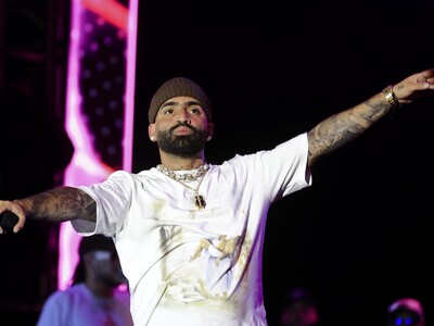 arcangel-revela-a-rosalia-que-se-enamoro-de-una-fanatica-5900de11-focus-0-0-400-300