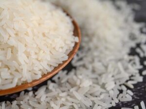 milled-rice-bowl-wooden-spoon-black-cement-floor-664d8ebb-focus-0-0-400-300