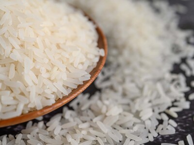 milled-rice-bowl-wooden-spoon-black-cement-floor-664d8ebb-focus-0-0-400-300
